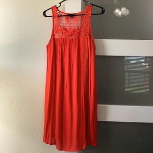 Sleeveless tangerine crochet detail dress.